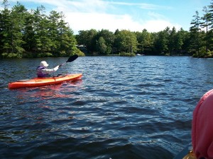 Trying to keep up with 3 paddling in a canoe. 